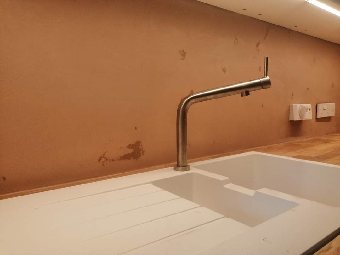 Kitchen walls after professional plaster skim