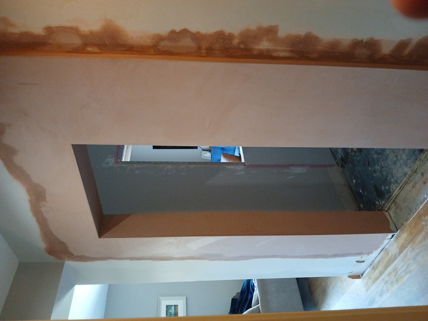 Doorframe area after skim plaster